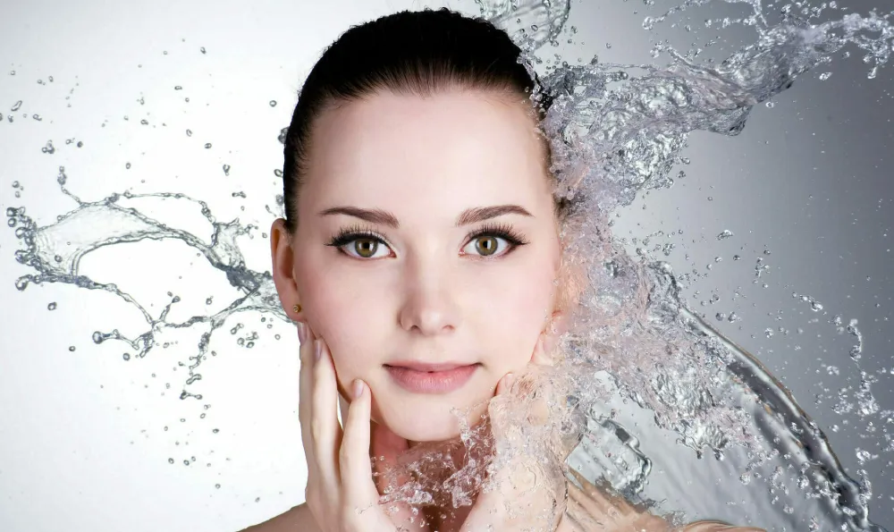 Water and face of beautiful sexy woman